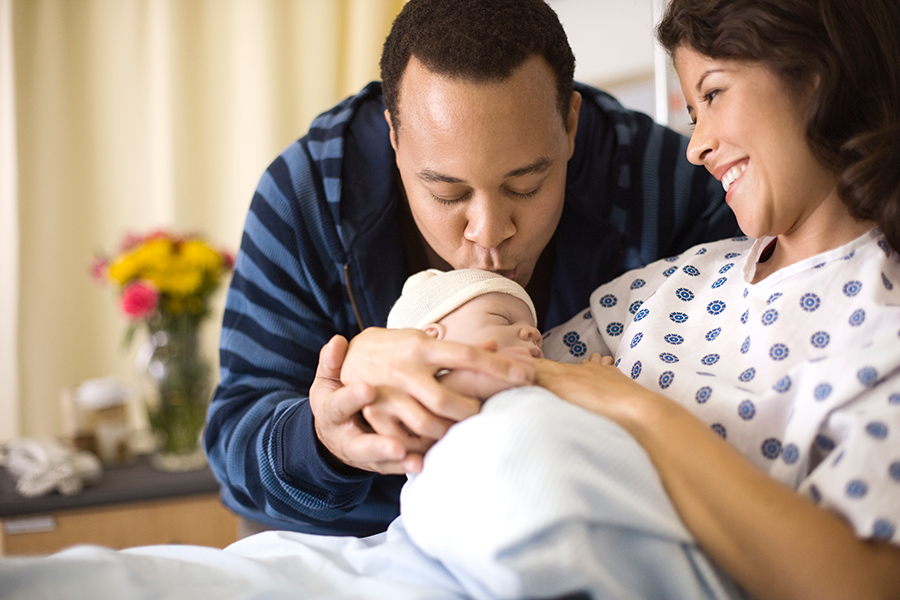 father mother and baby